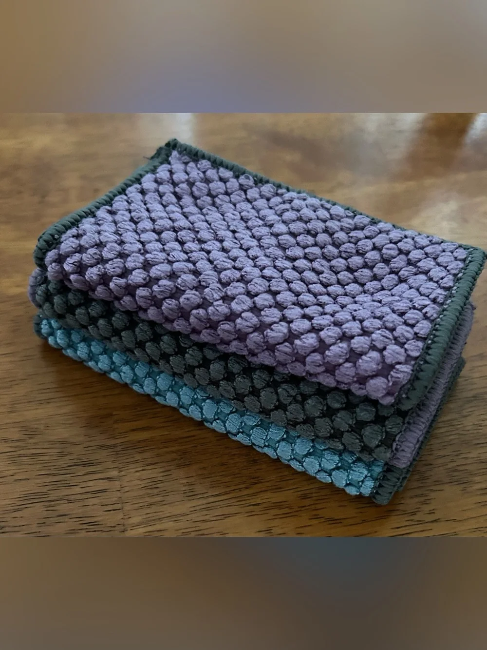 New-Norwex counter cloth 3 pack in eggplant, slate and teal.
